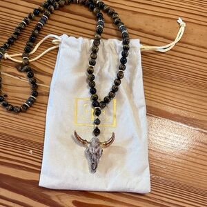 Easton Elle brown bead necklace bull head trimmed in gold. Dust bag. 18in
